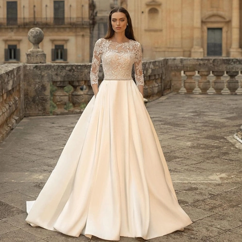 Elegante Trouwjurk Met Lange Mouwen Kant Satijn A-Lijn Bruidsjurk Rugloos Vloerlengte Ivoor Wit Vintage Dames