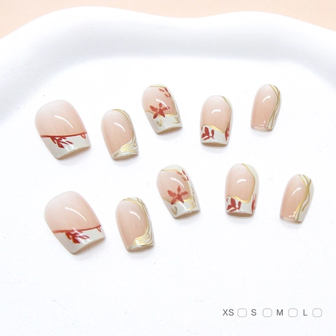 Unghie Finte Fatte A Mano Stile Francese Rosa Nude Con Disegno Fiori Bianchi Bordo Dorato Plastica ABS Rimovibile