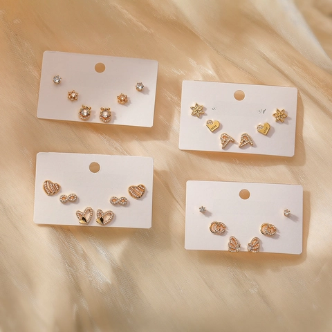 Ensemble de Boucles d'Oreilles Clous Exquises en Cuivre Plaqué Or 18K avec Strass pour Femmes Bijoux Incrustés Cœur Fleur Papillon