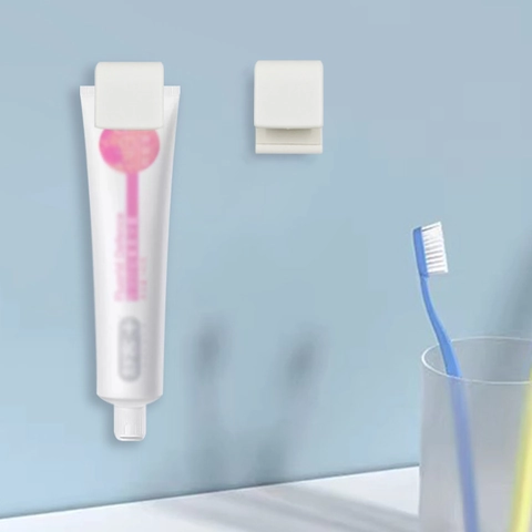 Spremi Tubetto Dentifricio Clip Da Parete Supporto Detergente Viso Senza Foro Plastica Organizzatore Bagno Appeso Accessorio