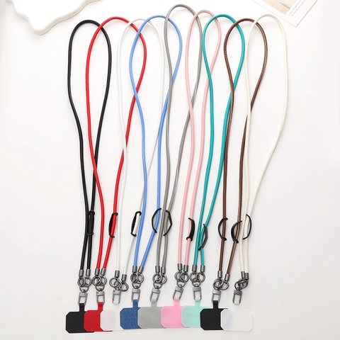 Cordon de Téléphone Universel en Cuir PU Bandoulière Réglable Sangle de Cou Anti-perte Avec Fermoir en Métal Pour Femmes Hommes Accessoires de Téléphone