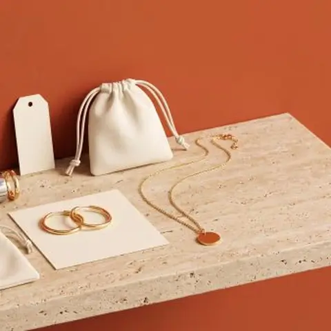 A branded jewelry line used to mean designing from scratch. Private label puts your name on quality pieces from vetted factories instead: you choose from a manufacturer's catalog, add your logo and packaging, and launch something that is yours. Here is how private label jewelry works, how it differs from white label and custom, and the six steps to sourcing it.
