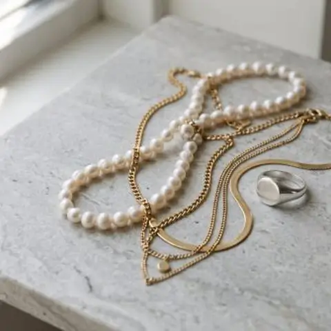 Every jewelry listing is a spec sheet in disguise. Learn to read the material line and you can predict how a piece will wear, who it suits, and what your returns inbox will look like in six months.