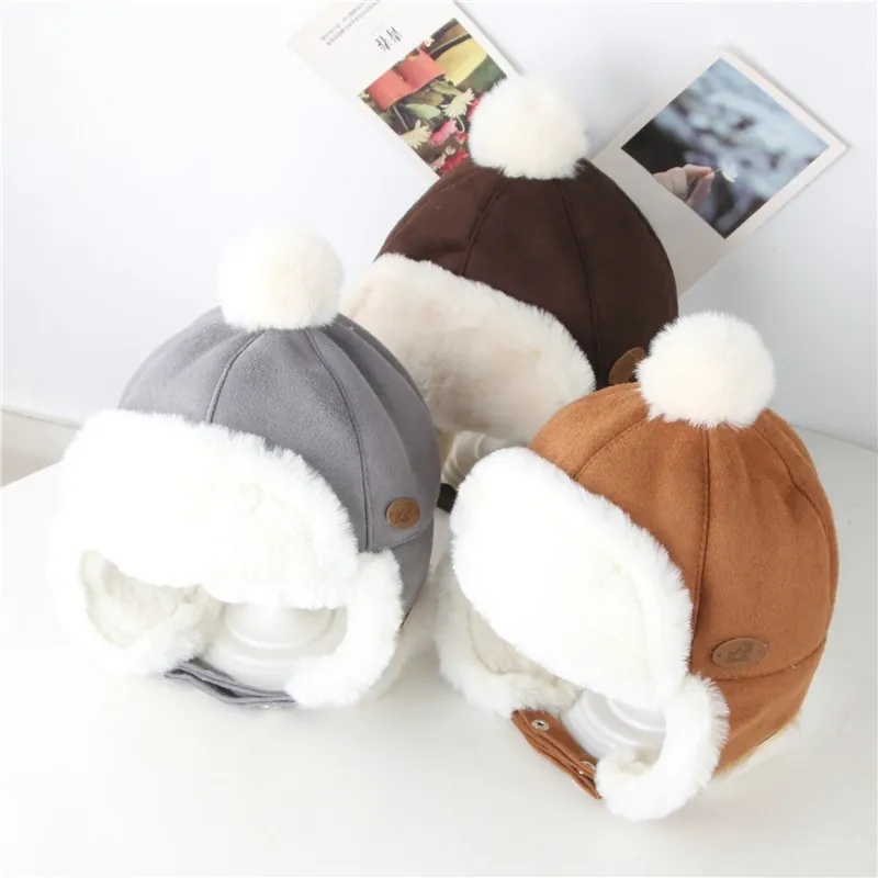 Chapeau Trappeur Hiver Enfant Suédine Doublure Polaire Chaude Oreillettes Bonnet Aviateur Avec Pompon Bébé