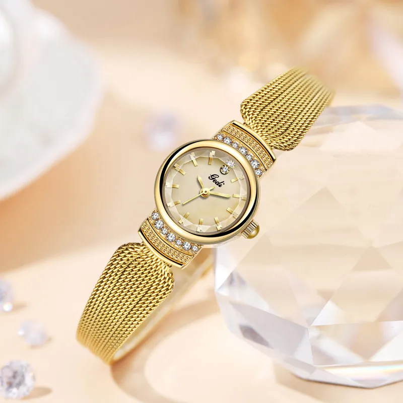 Elegant Women Fashion Quartz Watch Stainless Steel Mesh Band Rhinestone Accents Mother Of Artificial Pearl Dial