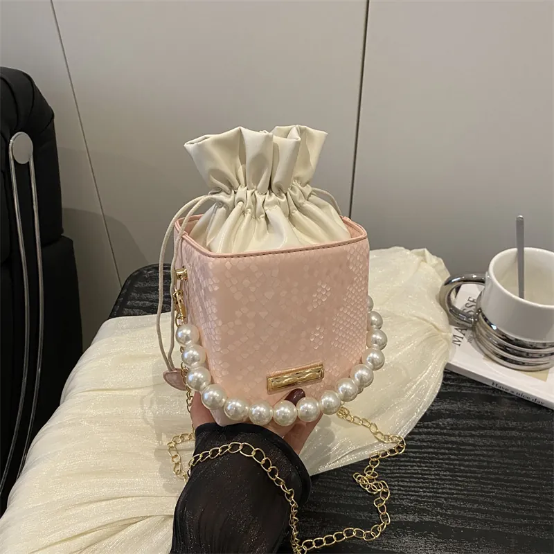 Women Mini Crossbody Bag Elegant Artificial Pearl Handle PU Leather Snake Pattern Drawstring Bucket Purse With Gold Chain Strap