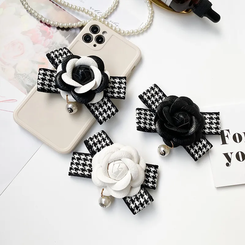 Support De Téléphone Fleur De Camélia Cuir Pied-De-Poule Noeud Künstliche Perle Pliable Poignée Air Cushion
