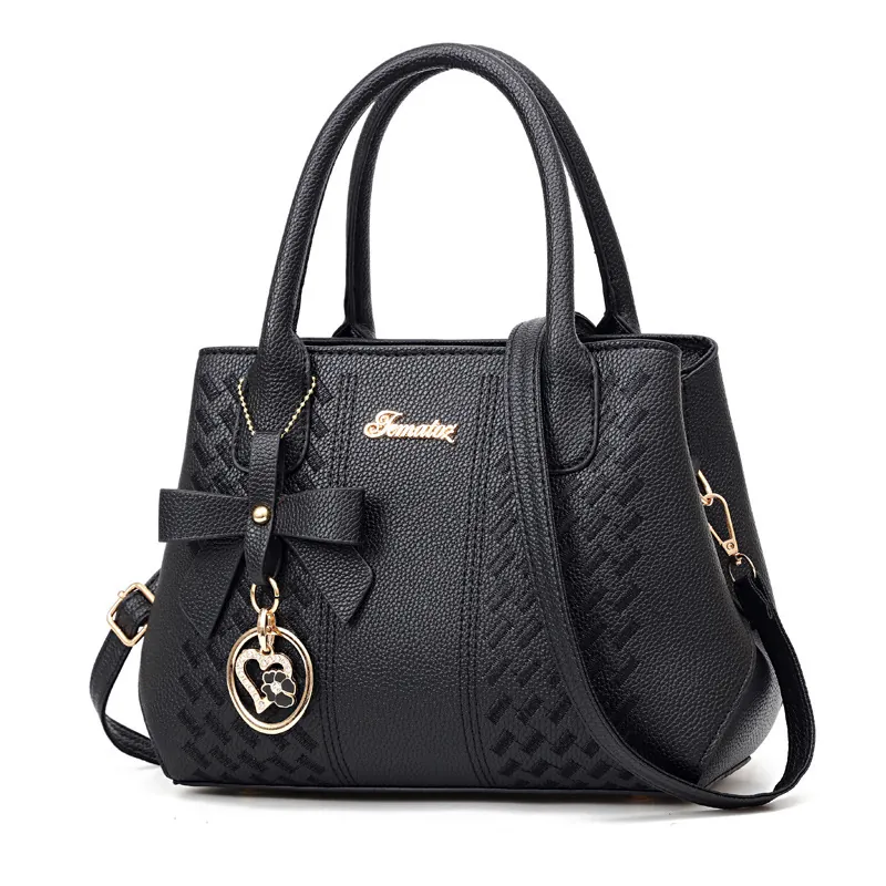 Sac À Main Femme Sac Bandoulière Texture Lychee Cuir PU Grande Capacité Élégant Nœud Pendentif Cœur Surpiqué Vintage