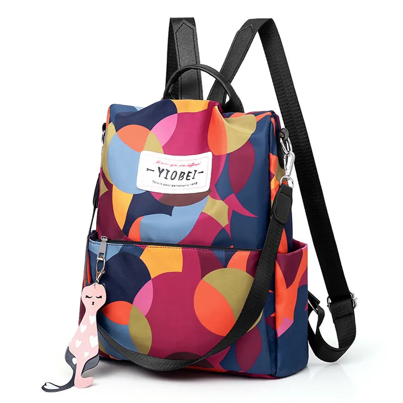 Zaino Da Donna Di Moda Stampa Geometrica Colorata Antifurto Tessuto Oxford Impermeabile Grande Capacità Borsa Da Viaggio Con Ciondolo Gatto