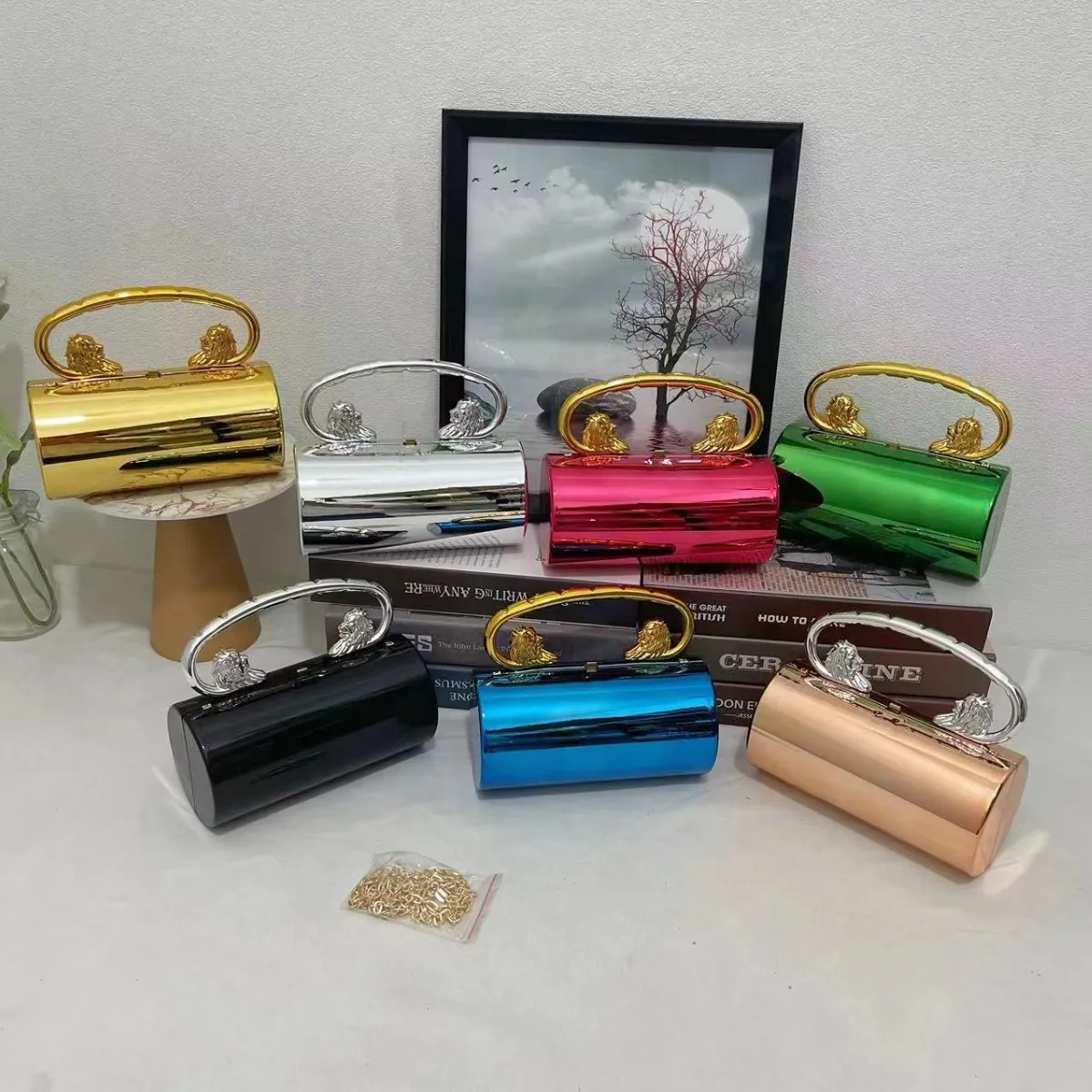 Cylindrical Metallic Evening Clutch Bag With Lion Head Handle And Detachable Chain Strap Elegant Mirror Texture Handbag