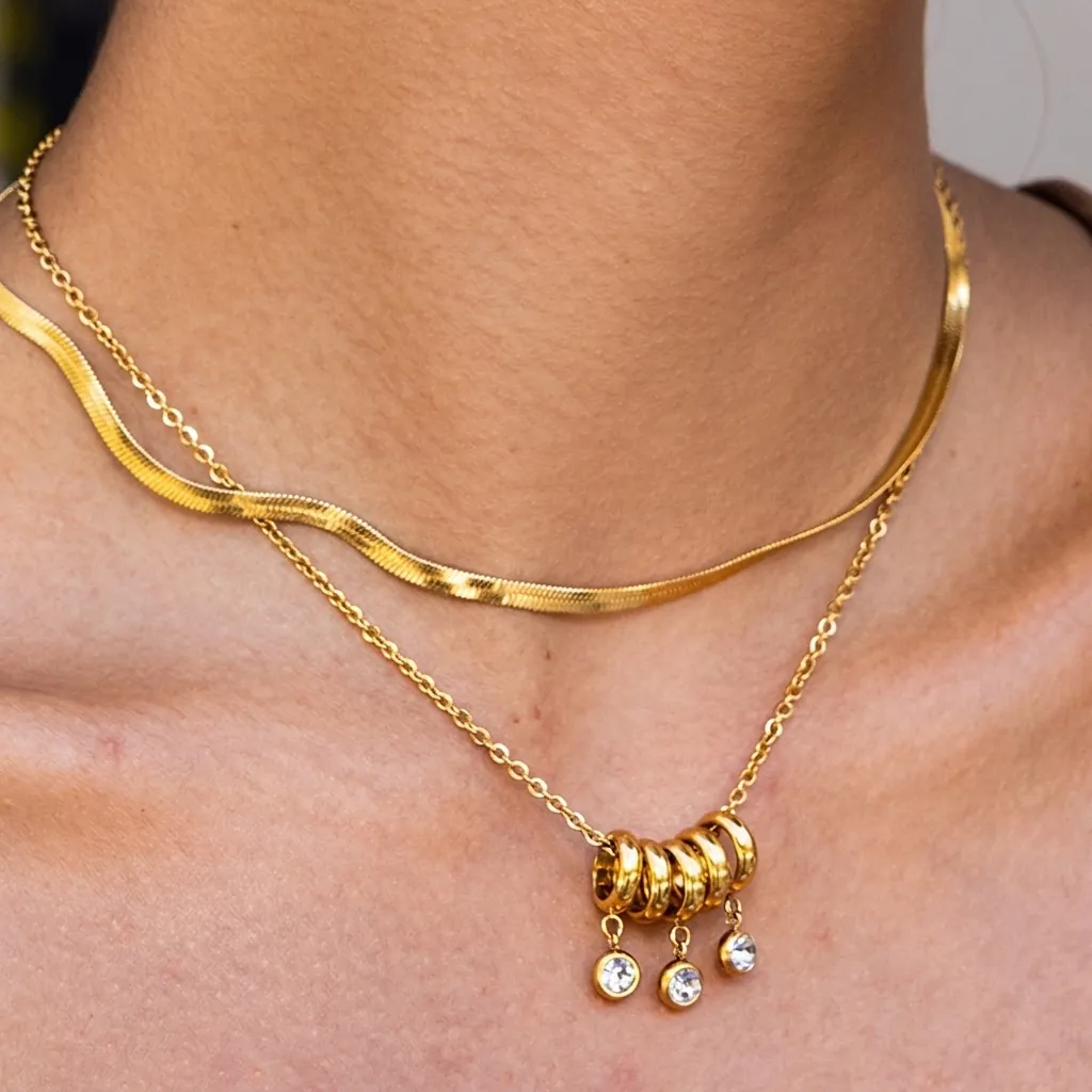 Collana A Doppio Strato Acciaio Inossidabile Placcato Oro 18K Catena A Serpente Anelli Intrecciati Pendente Strass Per Donna