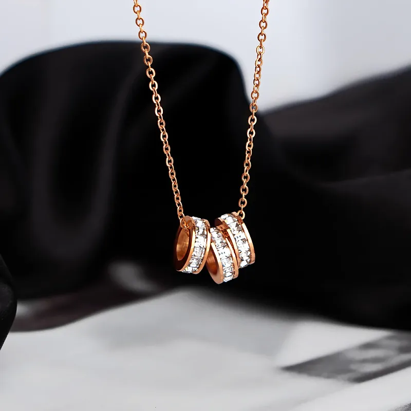 Interlocking Rings Pendant Necklace Stainless Steel Rose Gold Plated Rhinestone Inlaid Elegant Jewelry For Women