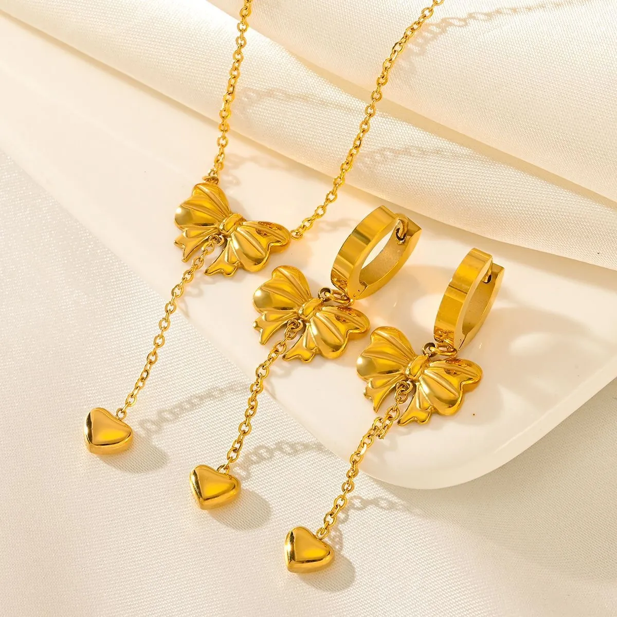 Boucles D'oreilles Pendantes Nœud Papillon Cœur Gland En Acier Inoxydable Plqué Or Style Vintage Français Pour Femmes
