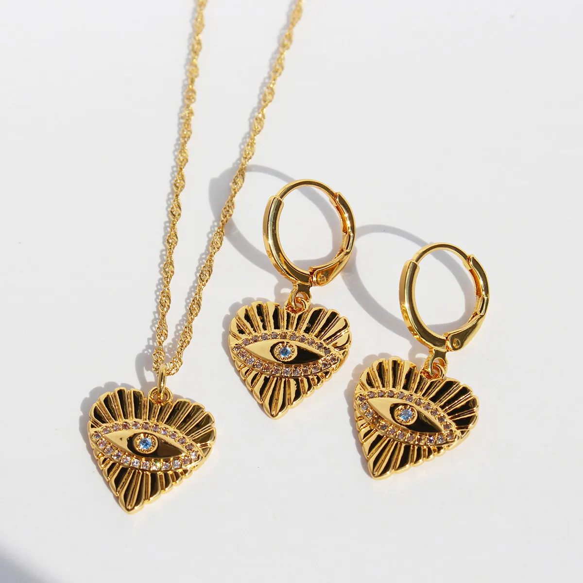Parure Collier Et Créoles Coeur Oeil Maléfique Laiton Avec Zircon Plaqué Or Texture Rayons De Soleil Bijoux Élégants Femmes