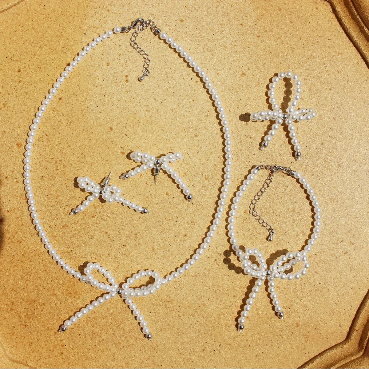 Elegant Bowknot Artificial Pearl Jewelry Set Brass Necklace Bracelet Earrings Ring For Women Original Design Beaded Jewelry