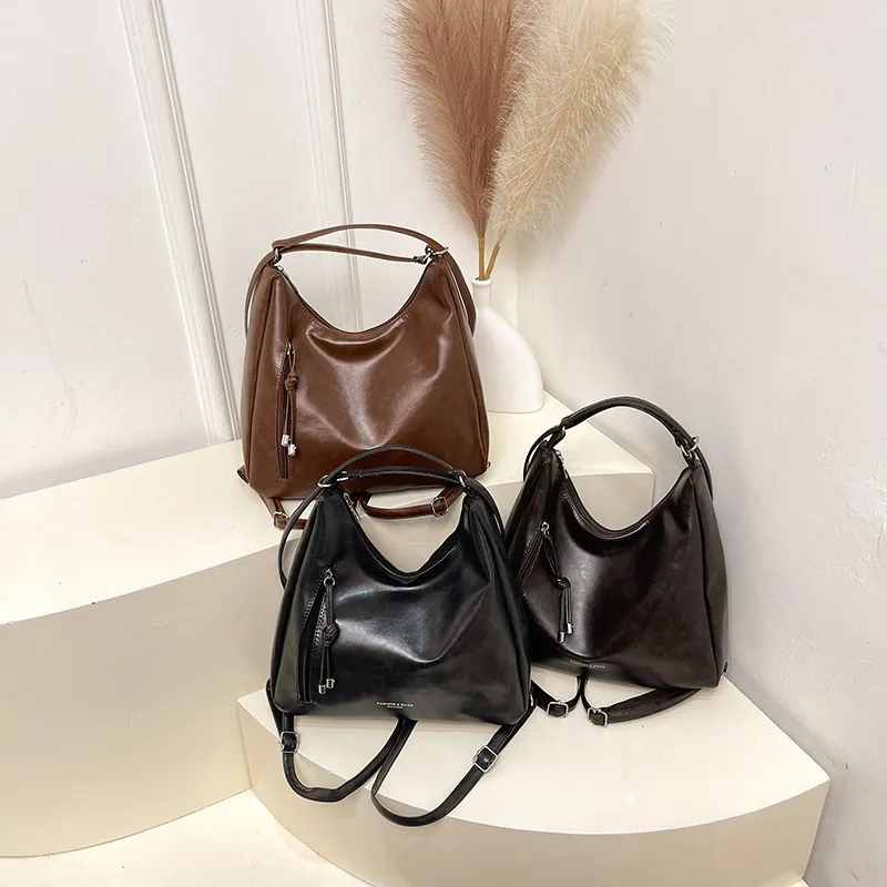 Vintage Women's PU Leather Hobo Bag Multi-functional Large Capacity Shoulder Crossbody Backpack With Tassel Detail For Commuting