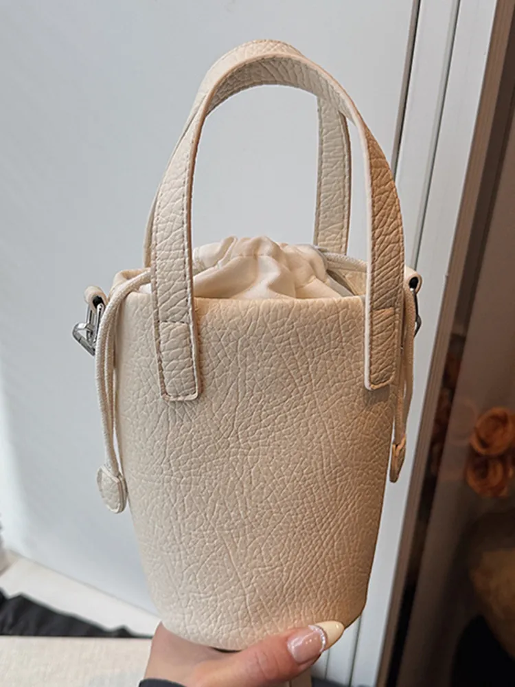 Sac Seau Minimaliste en Cuir PU Motif Lychee Pour Femmes Sac à Bandoulière Chic Avec Cordon de Serrage Main Élégant