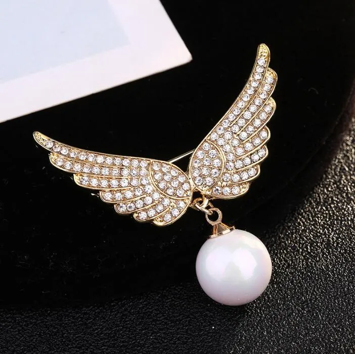 Broche Ailes d'Ange en Alliage Plaqué Or avec Strass et Künstliche Perle Élégante Broche Pendentif en Zircone pour Femmes Mariage Fête