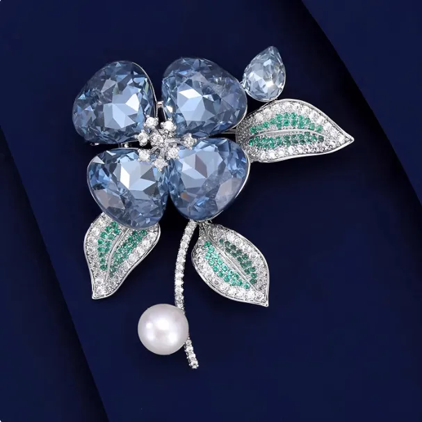 Exquise Broche Fleur d'Orchidée Pour Femme Alliage Cristal Bleu Strass Élégante Épingle en Künstliche Perle Pour Costume Bijoux de Mariage