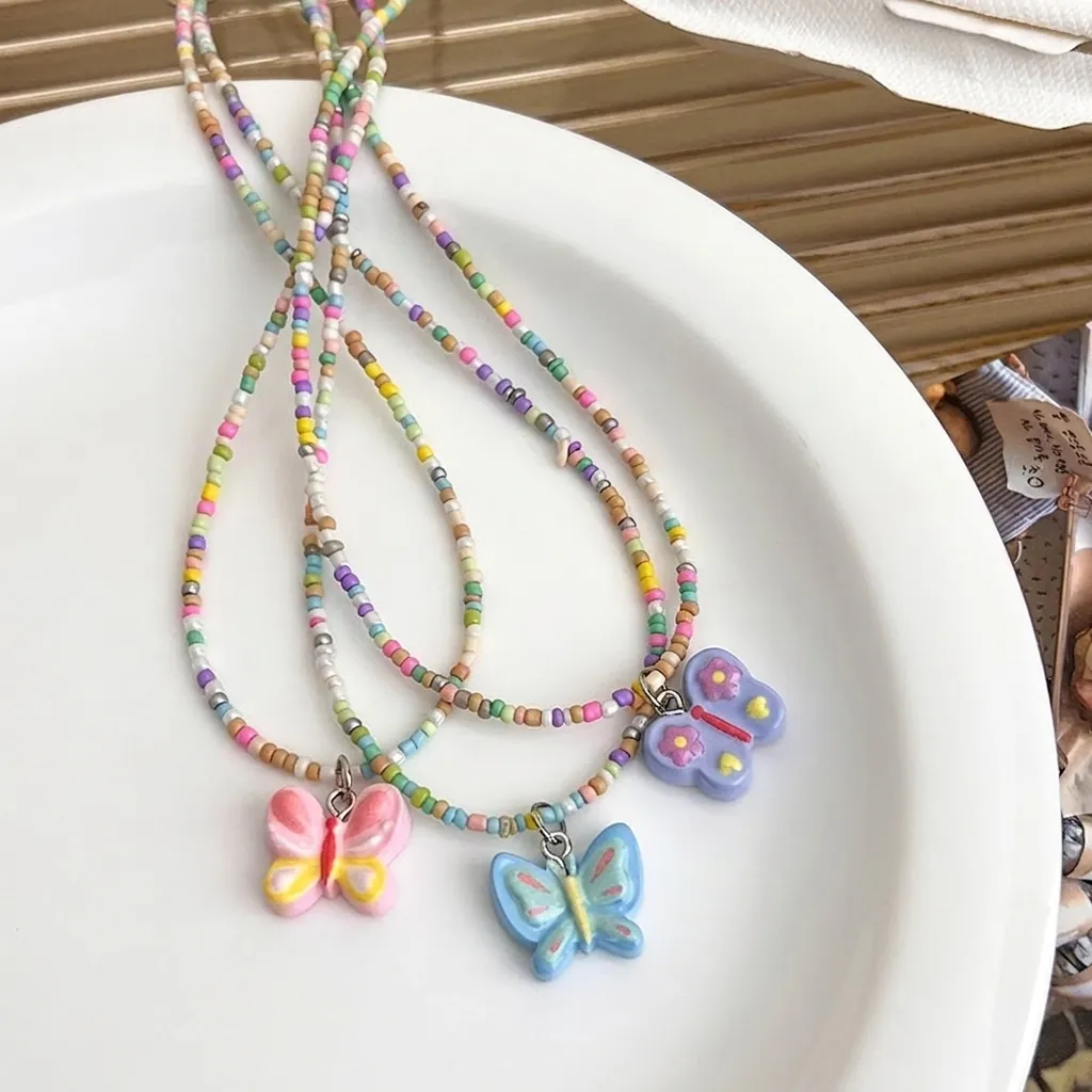 Collier Pendentif Papillon Perlé Coloré Fait à Main pour Femmes Style Doux Y2K Collier Ras Du Cou Papillon Bijoux