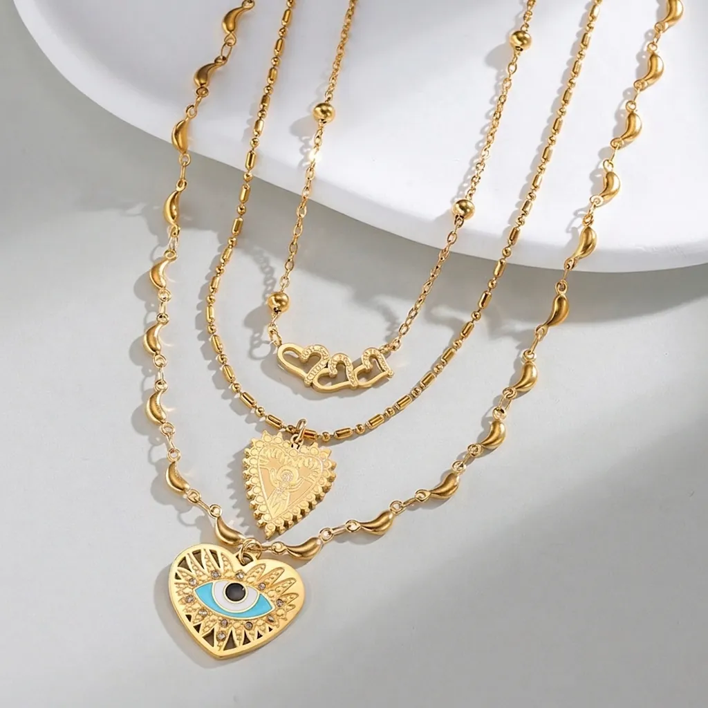 Collier Multicouche en Acier Inoxydable 304 Pendentif Cœur Mauvais Œil Plaqué Or Style Bohème Bijoux Femme