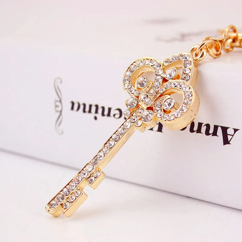 Porte-clés Vintage en Alliage de Zinc Doré avec Strass Forme de Clé Pendentif pour Femmes Charme de Sac Porte-clés de Luxe Cadeau Mode
