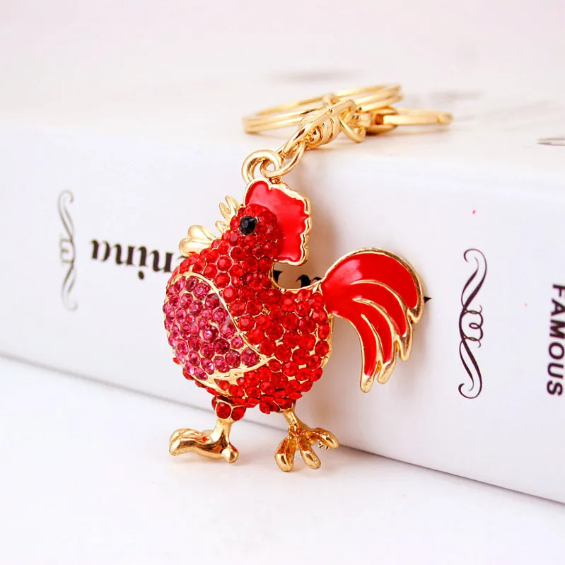 Squisito Portachiavi a Forma di Gallo in Lega di Zinco Oro con Ciondolo in Smalto e Strass Rossi per Borsa Regalo Donna Gioielli