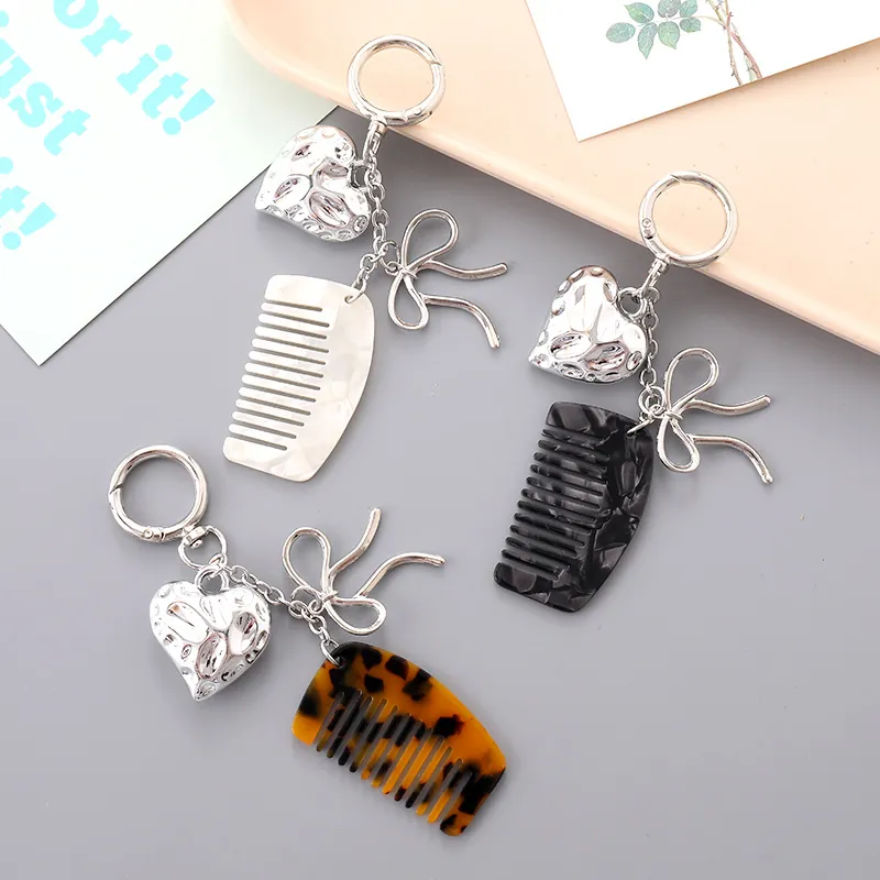 Porte-clés Pendentif Mini Peigne en Acétate Forme de Cœur pour Femmes Alliage Nœud Motif Marbre Charme de Sac Pendentif Téléphone