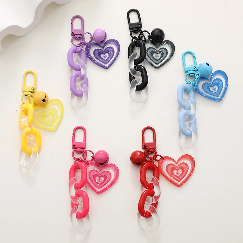 Portachiavi con Ciondolo a Cuore e Campanellino Catena in Acrilico Luccicante Charm per Borsa Donna Ragazza Regalo