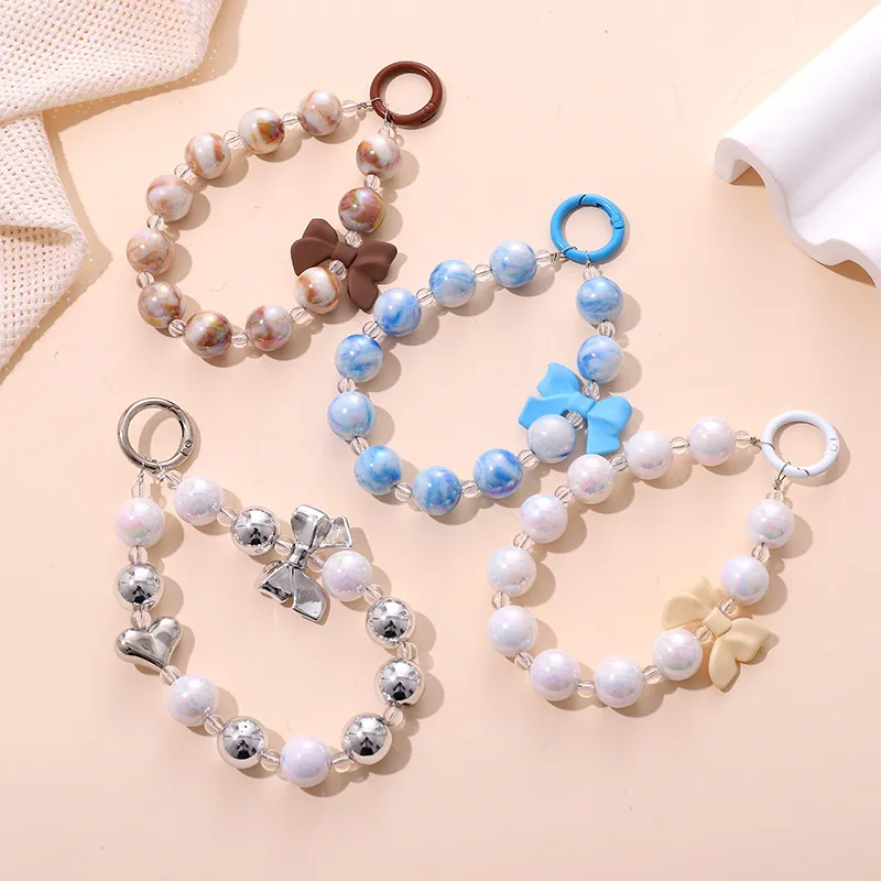 Bijou de Téléphone en Perles Acrylique Porte-clés pour Femmes Doux Marbre Iridescent Nœud Cœur Pendentif de Sac Accessoires Téléphone