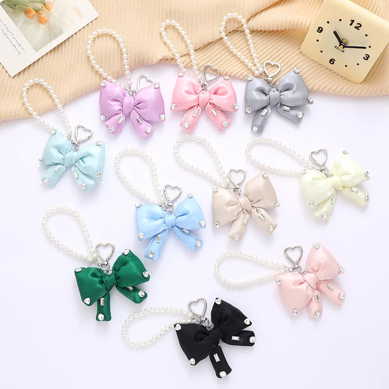 Élégant Porte-clés Nœud en Satin Avec Chaîne de Künstliche Perles de Culture Strass Boucle en Cœur Pendentif de Sac Femme