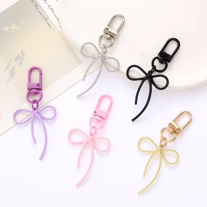 Portachiavi Minimalista in Lega con Fiocco Traforato Pendente per Borsa alla Moda per Donna Ragazza Oro Argento Rosa Nero