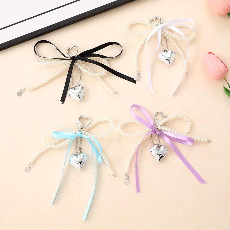 Porte-clés Pendentif Cœur Nœud en Ruban Künstliche Perle Artificielle Ruban de Satin Alliage Cœur Bijou de Sac pour Femme Décoration