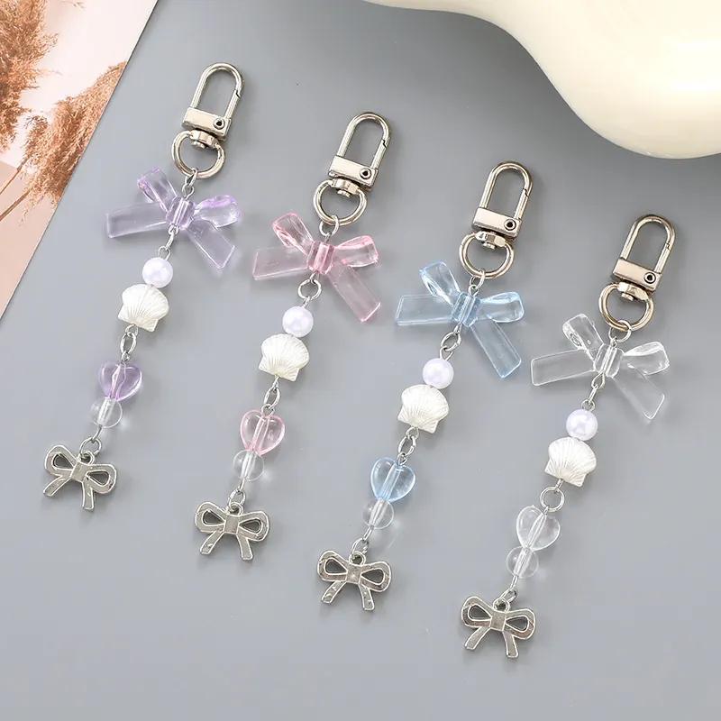 Portachiavi con Fiocco e Perline per Donna Ragazza Pendente a Cuore Conchiglia Perla Artificial Sintetica Ciondolo per Borsa Cellulare