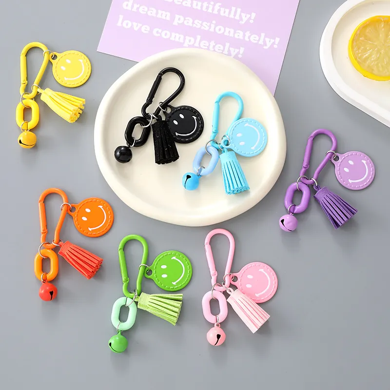 Fashion Metal Smiley Face Keychain With Colorful Tassel And Bell Candy Color Bag Charm For Women Phone Strap Pendant