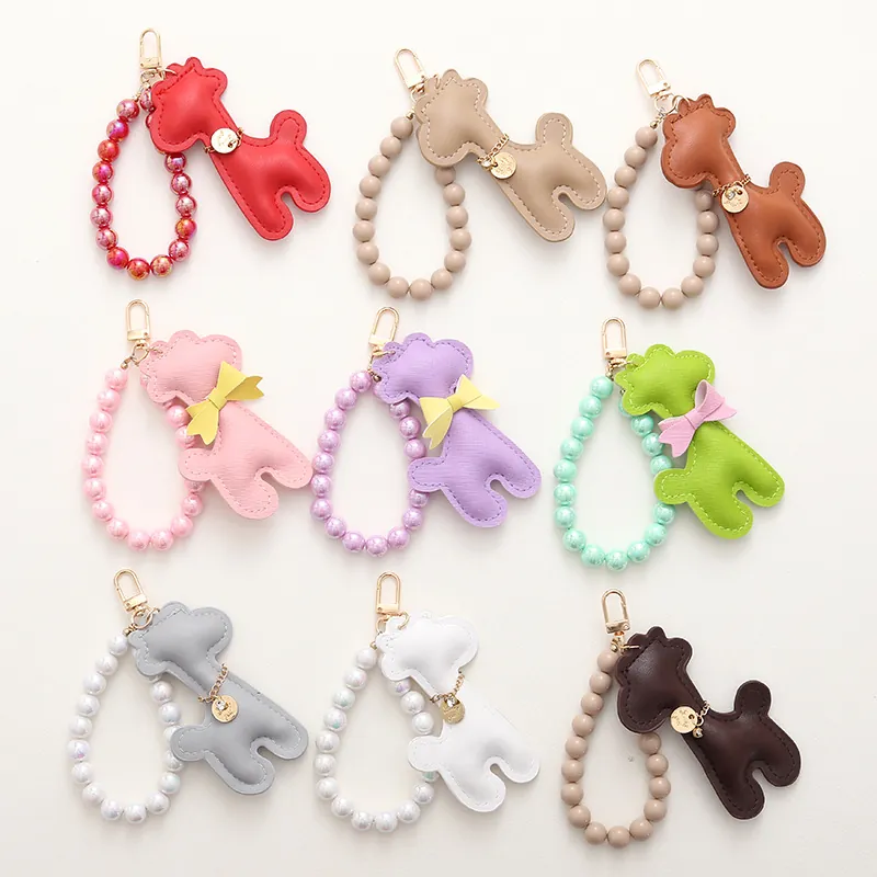 Porte-clés en Cuir PU Girafe Caniche Pendentif de Sac Perlé Avec Nœud Papillon Étiquette Lucky Girl Accessoire Femme