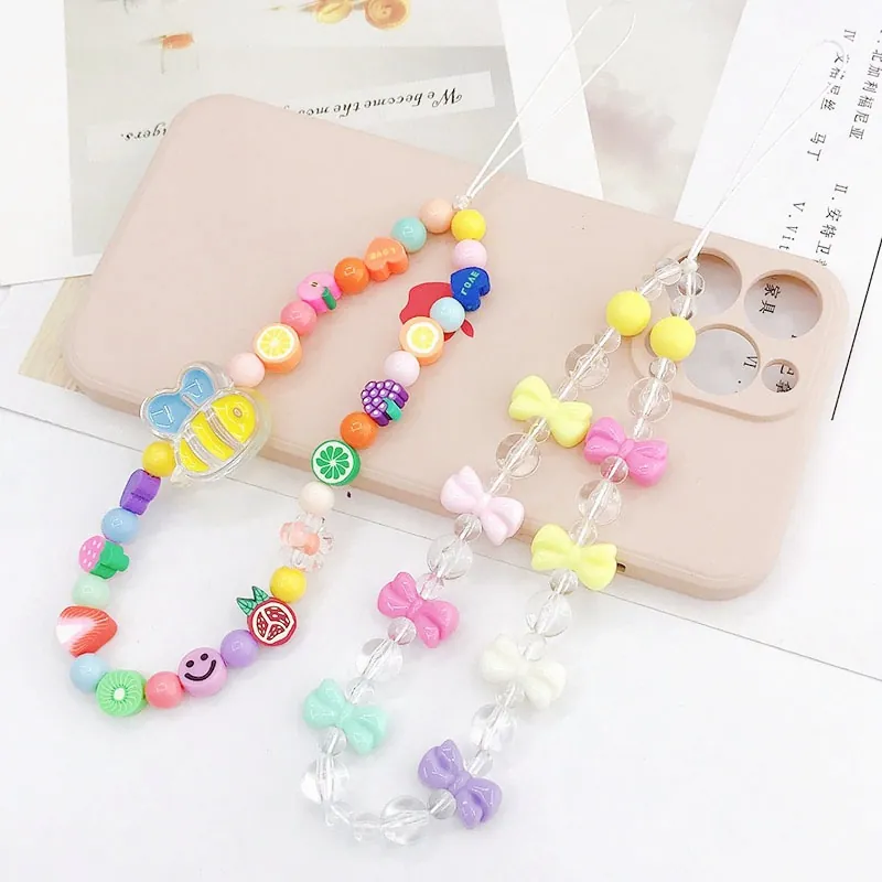 Charme de Téléphone Y2K en Acrylique avec Fruit Abeille Noeud Papillon Cordon Perlé Fait à la Main Dragonne Anti-chute pour Femmes Filles