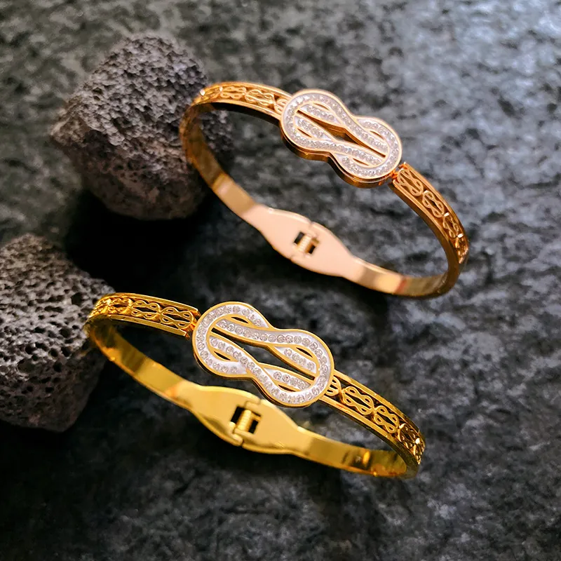 Stainless Steel Zirconia Mobius Bangle For Women Gold Rose Gold Plated Hollow Infinity Knot Spring Clasp Bracelet Jewelry