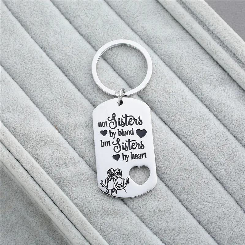 Not Sisters By Blood But Sisters By Heart Engraved Stainless Steel Keychain With Hollow Heart For Best Friends Women