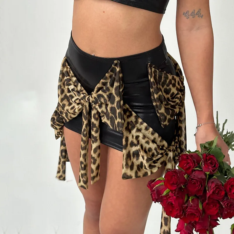 Minigonna Sexy in Ecopelle da Donna a Vita Alta Patchwork con Fiocchi Leopardati Gonna Corta Aderente da Discoteca Festa