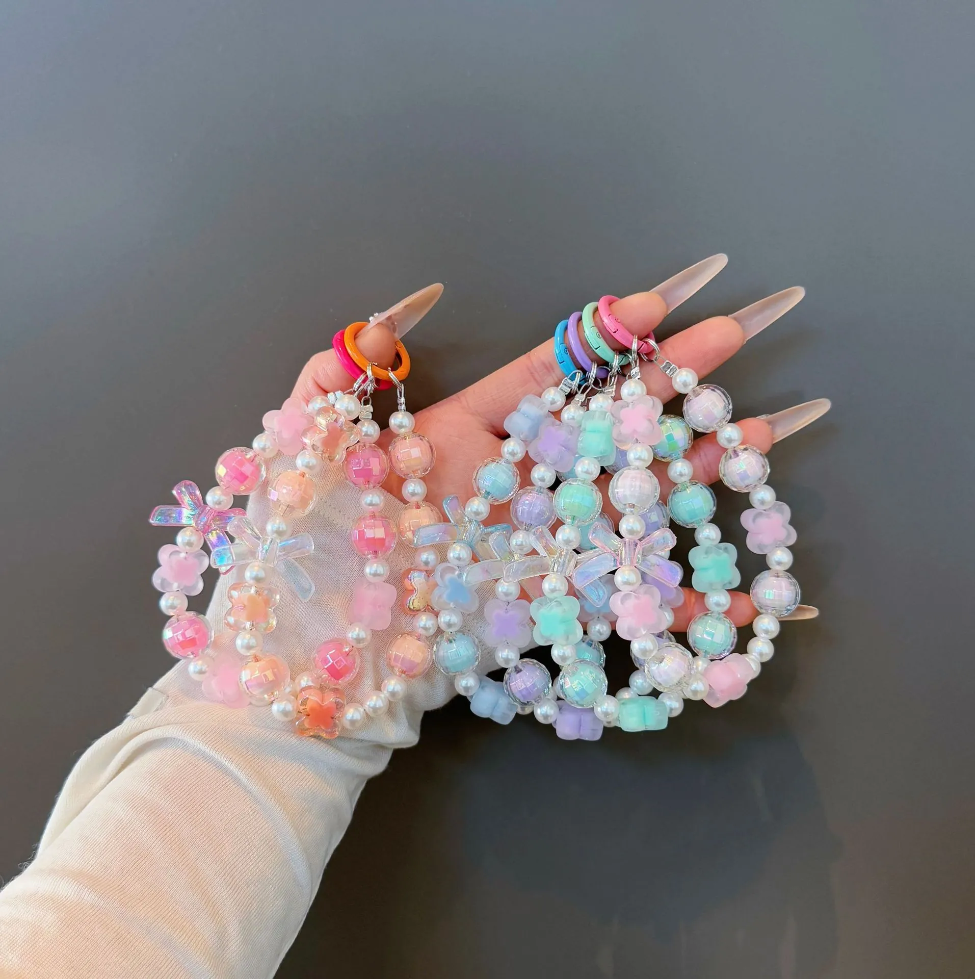 Sweet Bowknot Acrylic Beaded Phone Strap Artificial Pearl Clover Flower Keychain Fashion Bag Charm Accessory For Women Girls