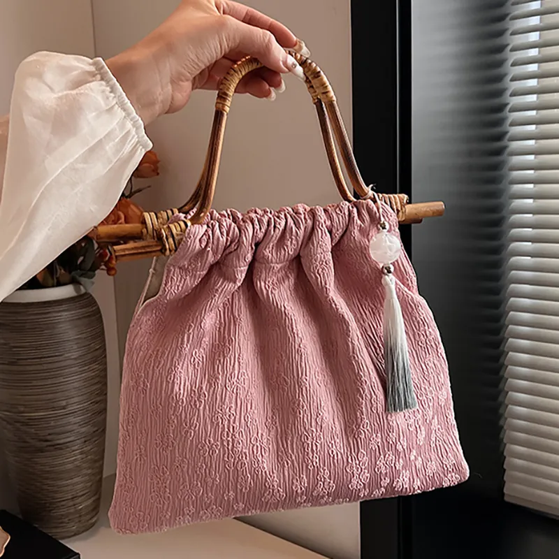 Nieuwe Chinese Stijl Jacquard Bloemen Handtas Voor Vrouwen Retro Bamboe Handvat Trekkoord Emmer Tas Met Elegante Kwast