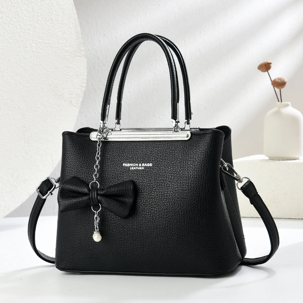 Borsa a Mano da Donna in Pelle PU con Motivo Lychee Elegante Ciondolo a Fiocco con Künstliche Perle Grande Capacità Borsa a Tracolla