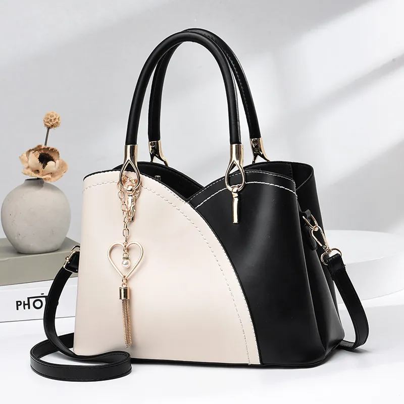 Borsa a Mano da Donna in Pelle PU a Blocchi di Colore Ciondolo a Cuore con Nappina Borsa a Tracolla Elegante per Ufficio Quotidiano