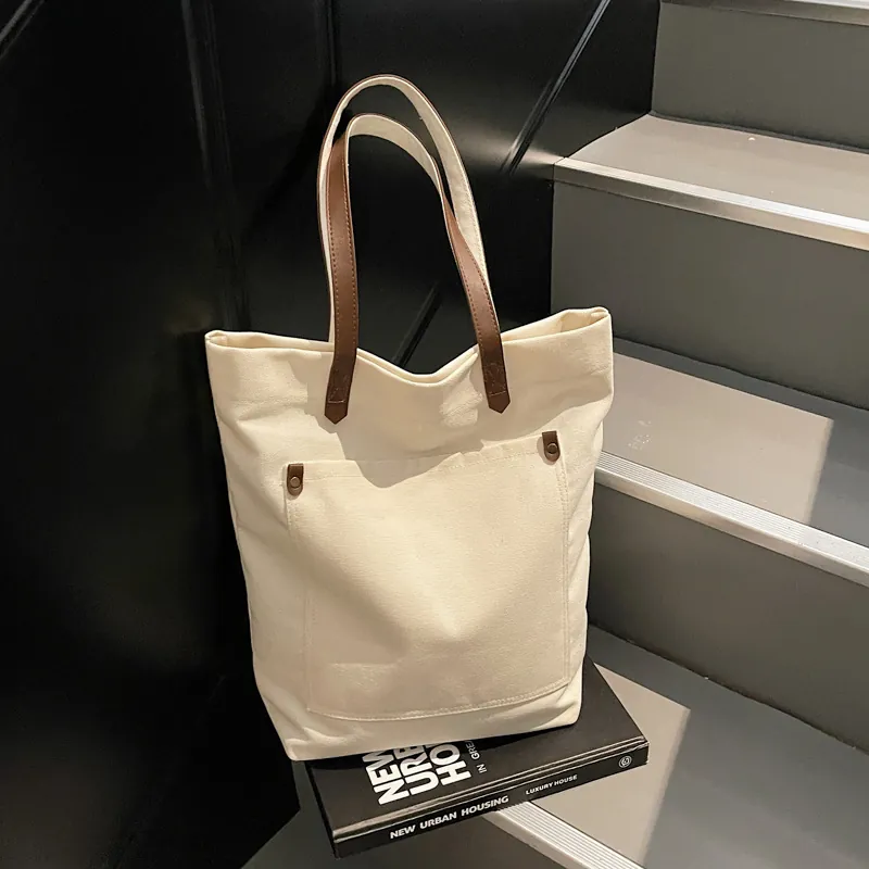 Minimalist Large Capacity Canvas Tote Bag For Women Casual Solid Color Shoulder Bag With Front Pocket Metal Studs Strap