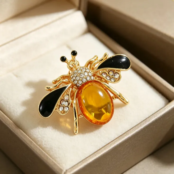 Elegant Gold Alloy Rhinestone Bowknot Brooch For Women Sparkling Crystal Bow Safety Pin Decorative Clothing Accessory Jewelry