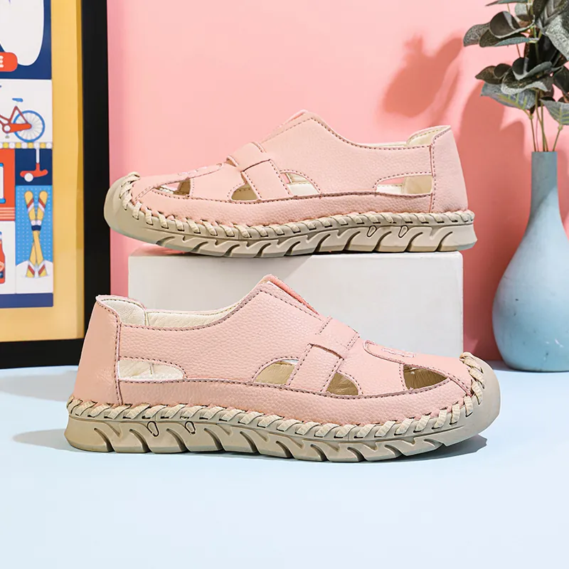 Damen Echtes Leder Outdoor Atmungsaktive Clogs Durchbrochene Handgenähte Sohle Lässige Sandalen Rutschfeste Sommerschuhe