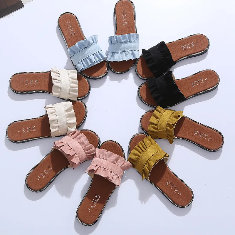 Pantoufles Plates en Suède à Volants pour Femmes Couleur Unie Design Minimaliste Sandales de Plage Décontractées Légères et Antidérapantes