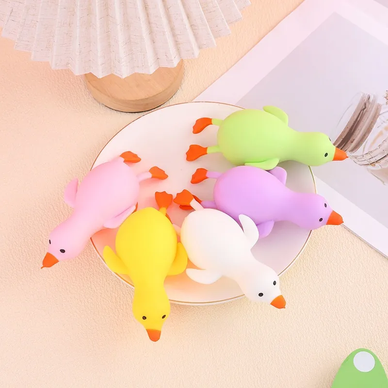 Jouet Squishy Canard Dessin Animé Rebond Lent Jouet de Décompression pour Enfants Adultes Forme de Caneton TPR Jouet à Presser