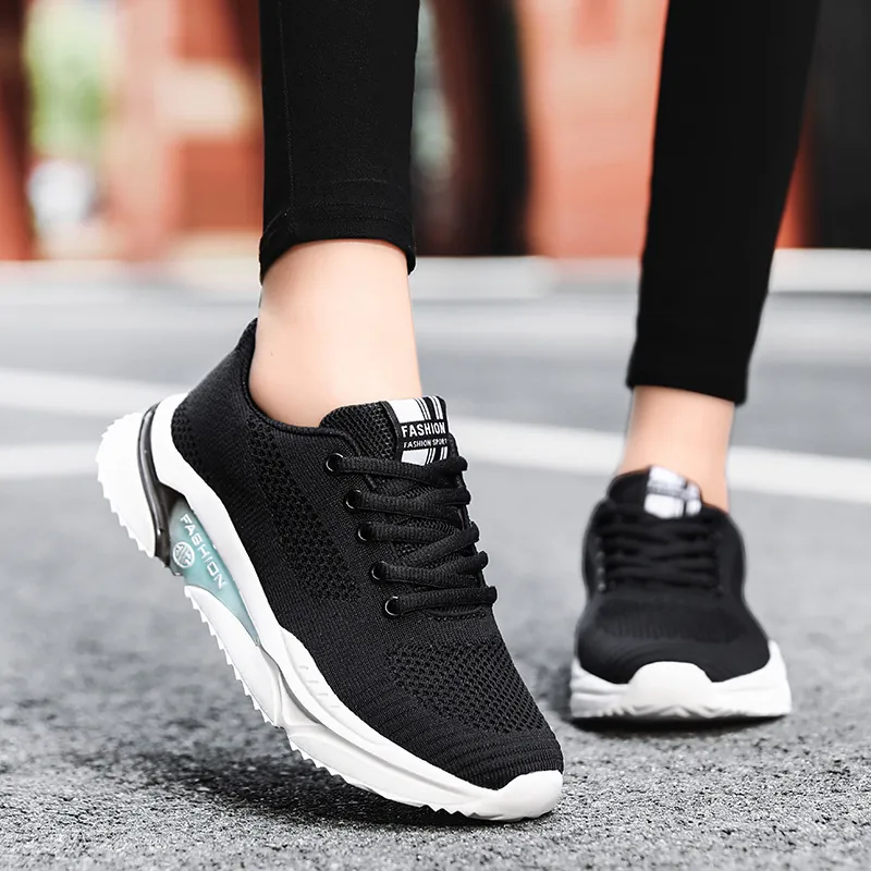 Sneakers da Donna Traspiranti in Mesh Flyknit Scarpe da Corsa Casual di Moda Leggere Antiscivolo Sportive Scarpe da Passeggio